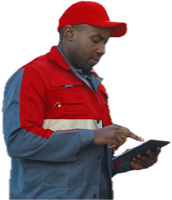 EX Transportation delivery driver checking a route on a tablet beside a loaded van