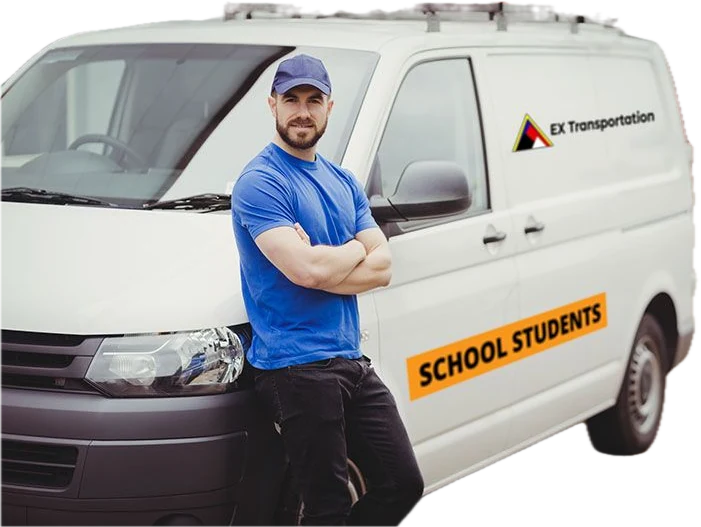EX Transportation driver standing with arms crossed in front of a school students van