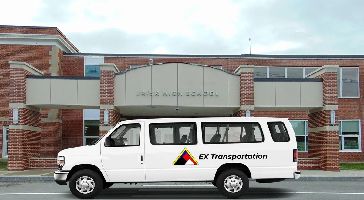 EX Transportation van in front of a school